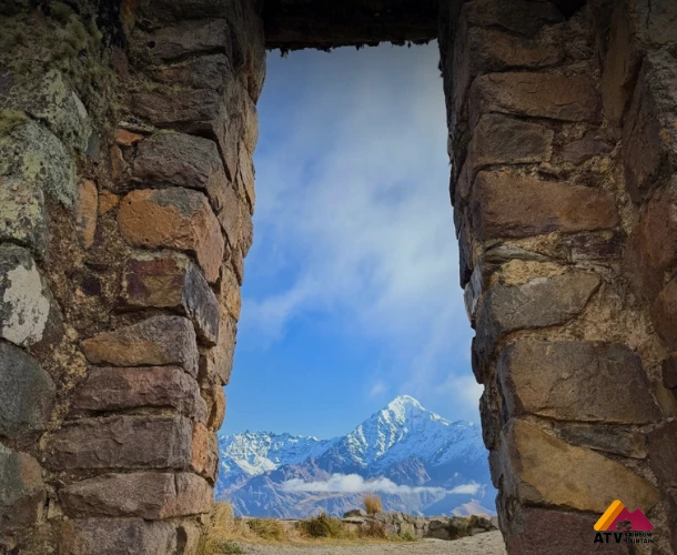 Window to the Majestic Snow-Capped Peak